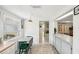 Bright and airy kitchen featuring a cozy breakfast nook and a functional layout at 5616 Riddle Rd, Holiday, FL 34690
