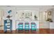 Open concept living area showcasing the breakfast bar that connects the kitchen to the living room at 5616 Riddle Rd, Holiday, FL 34690