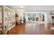 Light-filled open concept living room offers hardwood floors and water views at 5616 Riddle Rd, Holiday, FL 34690