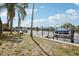 Waterfront backyard with dock and boatlift at 5616 Riddle Rd, Holiday, FL 34690