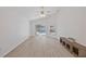 Bedroom with lots of bright, natural light, laminate flooring, and backyard pool view at 7001 Cohasset Cir, Riverview, FL 33578