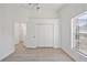 Office features a closet, ceiling fan and wood-look floors at 7001 Cohasset Cir, Riverview, FL 33578