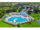 Expansive community pool offers ample seating and a separate pool at 7001 Cohasset Cir, Riverview, FL 33578
