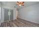 Empty bedroom with ceiling fan, closet, and window at 701 W Idlewild Ave, Tampa, FL 33604