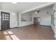 Bright sunroom featuring tile flooring, ceiling fan, and glass sliding doors at 701 W Idlewild Ave, Tampa, FL 33604
