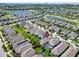 Community aerial view showcasing nearby lakes and surrounding homes at 7417 Sungold Meadow Ct, Apollo Beach, FL 33572