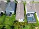 A beautiful aerial view of a well-maintained backyard and the home's roof at 7417 Sungold Meadow Ct, Apollo Beach, FL 33572