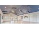This community center features a chef's kitchen, bar seating, and plenty of space for gathering at 7417 Sungold Meadow Ct, Apollo Beach, FL 33572