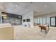 Expansive clubhouse featuring a chalkboard wall, multiple televisions, and comfortable seating at 7417 Sungold Meadow Ct, Apollo Beach, FL 33572