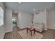 Spacious living room with an area rug, recessed lighting, and seamless transition to dining area at 7417 Sungold Meadow Ct, Apollo Beach, FL 33572