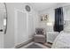 Bright bedroom with a ceiling fan, a sliding door closet, and modern decorations at 7747 90Th N Way, Seminole, FL 33777