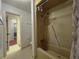 Full bathroom with a bathtub shower, tile flooring, and neutral-colored walls at 7939 Pine Dr # 7939, Temple Terrace, FL 33637