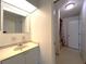 Bathroom featuring a vanity with a sink and a bathtub shower combo at 7939 Pine Dr # 7939, Temple Terrace, FL 33637