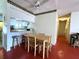 Bright dining area with table, chairs, and ceiling fan at 7939 Pine Dr # 7939, Temple Terrace, FL 33637