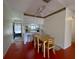 Cozy dining area adjacent to kitchen with wooden table and chairs at 7939 Pine Dr # 7939, Temple Terrace, FL 33637