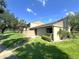 Charming single-story home with well-manicured lawn and mature trees, perfect for serene living at 7939 Pine Dr # 7939, Temple Terrace, FL 33637