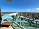 Balcony offers stunning panoramic views of the beach, ocean, and the coastal community at 880 Mandalay Ave # N1004, Clearwater Beach, FL 33767