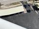 This aerial view shows the parking area under the canopy at 880 Mandalay Ave # N1004, Clearwater Beach, FL 33767