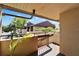 This condo features a cozy balcony with views of surrounding trees and a glimpse of other units at 880 S Village N Dr # 202, St Petersburg, FL 33716