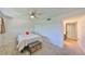 Comfortable bedroom includes ceiling fan, and closet space for ample storage at 880 S Village N Dr # 202, St Petersburg, FL 33716