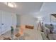 Bright living room featuring sleek floors, comfortable seating, and modern decor at 880 S Village N Dr # 202, St Petersburg, FL 33716