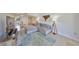 This condo features a comfortable living space with an open layout and modern decor at 880 S Village N Dr # 202, St Petersburg, FL 33716