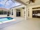 A view of the pool area highlighting the outdoor space and tile pool at 8907 Magnolia Chase Cirs, Tampa, FL 33647