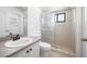 Bathroom with a vanity and a shower with sliding glass doors at 1061 Archway Dr, Spring Hill, FL 34608