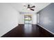 Large bedroom with wood floors and lots of light at 1061 Archway Dr, Spring Hill, FL 34608