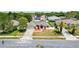 Charming home with fresh landscaping, a two-car garage, and a well-maintained lawn in a suburban neighborhood at 1061 Archway Dr, Spring Hill, FL 34608