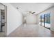 Living room with sliding glass door to the pool at 1061 Archway Dr, Spring Hill, FL 34608