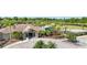 View of the community center, basketball court, playground, and well-maintained landscaping at 11207 Flora Springs Dr, Riverview, FL 33579
