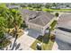 Well-maintained home showcasing manicured landscaping and a spacious driveway at 11207 Flora Springs Dr, Riverview, FL 33579