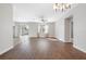 Bright living space with hardwood floors, lots of natural light, and a sliding door to the patio at 11207 Flora Springs Dr, Riverview, FL 33579