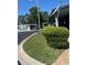 Property featuring low-maintenance landscaping and covered parking at 12501 Ulmerton Rd # 216, Largo, FL 33774