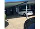 Covered parking provides ample space for vehicles and outdoor storage at 12501 Ulmerton Rd # 216, Largo, FL 33774