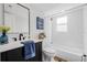 Stylishly updated bathroom with tub-shower, modern fixtures, and thoughtful decor at 12641 98Th St, Largo, FL 33773