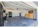 Bright, spacious garage with ample storage, plywood, and water heater, ready for your projects and vehicles at 12641 98Th St, Largo, FL 33773