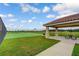 Outdoor basketball court with covered picnic area, perfect for sports and recreation at 13334 Palmera Vista Dr, Riverview, FL 33579