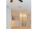 Bonus room with carpet flooring, neutral walls, and access to stairs and other rooms at 13334 Palmera Vista Dr, Riverview, FL 33579
