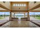 Inviting community pool area featuring covered seating and stunning water views at 13334 Palmera Vista Dr, Riverview, FL 33579