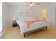 Light and bright bedroom with bamboo floors and ceiling fan at 1411 Gray S St, Gulfport, FL 33707
