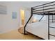 This bedroom features a bunk bed and connects to an ensuite bathroom at 1411 Gray S St, Gulfport, FL 33707
