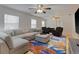 Spacious living room with a sectional sofa, area rug, and wood flooring at 1411 Gray S St, Gulfport, FL 33707