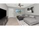 Stylish living room with modern décor, a comfortable sofa, and a TV, perfect for relaxation and entertainment at 1545 Illinois Rd, Clearwater, FL 33756
