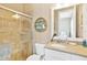 Tastefully appointed bathroom with a glass-enclosed shower and vanity at 16419 Chapman Crossing Dr, Lithia, FL 33547