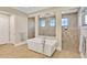 Bright bathroom with a freestanding tub and spacious walk-in shower, offering relaxation and comfort at 16419 Chapman Crossing Dr, Lithia, FL 33547