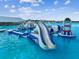 Amazing inflatables water park with slides, climbing features, and water activities at 16625 Goose Ribbon Pl, Wimauma, FL 33598