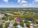 Beautiful neighborhood lot, surrounded by lush landscaping and community features at 1727 Woodpond Way, Lutz, FL 33559