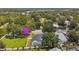 The location is surrounded by lush greenery and beautiful landscaping at 1727 Woodpond Way, Lutz, FL 33559